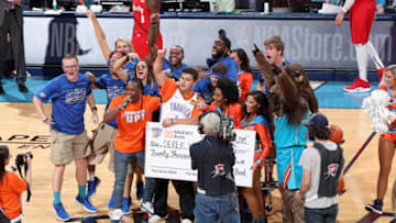 A fan celebrates after making a half-court shot for $20,000 during Game Three of 2019 NBA Playoffs between the Portland Trail Blazers and OKC Thunder (Photo by Joe Murphy/NBAE via Getty Images)