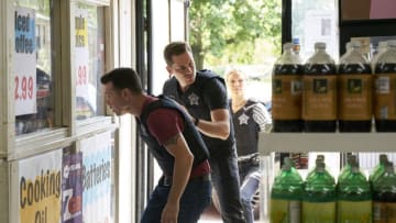 CHICAGO P.D. -- "Snitch" Episode 504 -- Pictured: (l-r) Jon Seda as Antonio Dawson, Jesse Lee Soffer as Jay Halstead, Tracy Spiridakos as Hailey Upton -- (Photo by: Parrish Lewis/NBC)