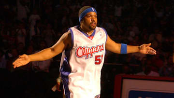Ice Cube aka O'Shea Jackson acknowledges the crowd during player introductions for Los Angeles Clippers Celebrity basketball game at the Staples Center in Los Angeles, Calif. on Friday, March 25, 2005. (Photo by Kirby Lee/WireImage)