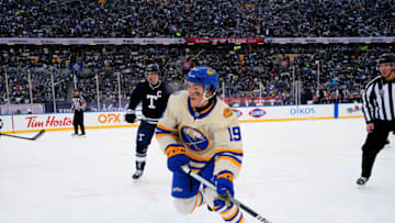 Mar 13, 2022; Hamilton, Ontario, CAN; Buffalo Sabres forward Peyton Krebs (19) skates against the Toronto Maple Leafs in the 2022 Heritage Classic ice hockey game at Tim Hortons Field. Mandatory Credit: John E. Sokolowski-USA TODAY Sports