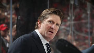 NEWARK, NJ - APRIL 05: Mike Babcock of the Toronto Maple Leafs handles bench duties against the New Jersey Devils at the Prudential Center on April 5, 2018 in Newark, New Jersey. The Devils defeated the Maple Leafs 2-1 to clinch a playoff position. (Photo by Bruce Bennett/Getty Images)