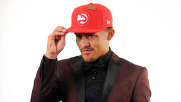 BROOKLYN, NY - JUNE 21: Trae Young poses for a photo after being selected fifth overall at the 2018 NBA Draft on June 21, 2018 at the Barclays Center in Brooklyn, New York. NOTE TO USER: User expressly acknowledges and agrees that, by downloading and/or using this photograph, user is consenting to the terms and conditions of the Getty Images License Agreement. Mandatory Copyright Notice: Copyright 2018 NBAE (Photo by Stephen Pellegrino/NBAE via Getty Images)