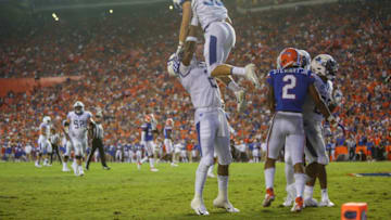 GAINESVILLE, FL - SEPTEMBER 08: Kentucky Wildcats wide receiver Dorian Baker (2) lifts Kentucky Wildcats wide receiver David Bouvier (33) after a touchdown during the game between the Kentucky Wildcats and the Florida Gators on September 8, 2018, at Ben Hill Griffin Stadium at Florida Field in Gainesville, Fl. (Photo by David Rosenblum/Icon Sportswire via Getty Images)