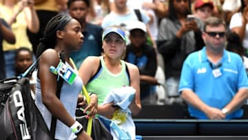 TOPSHOT - Coco Gauff of the US walks off the court after losing against Sofia Kenin of the US during their women's singles match on day seven of the Australian Open tennis tournament in Melbourne on January 26, 2020. (Photo by John DONEGAN / AFP) / IMAGE RESTRICTED TO EDITORIAL USE - STRICTLY NO COMMERCIAL USE (Photo by JOHN DONEGAN/AFP via Getty Images)