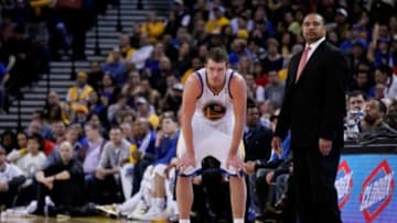 Jan 26, 2014; Oakland, CA, USA; Golden State Warriors forward David Lee (10) stands next to head coach Mark Jackson during a break in the action against the Portland Trail Blazers in the fourth quarter at Oracle Arena. The Warriors defeated the Trail Blazers 103-88. Mandatory Credit: Cary Edmondson-USA TODAY Sports
