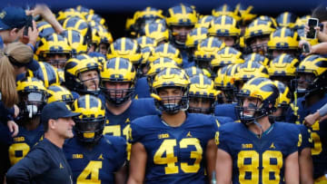 ANN ARBOR, MI - OCTOBER 01: Michigan Wolverines head football coach leads his team onto the field prior to the start of the game against the Wisconsin Badgers at Michigan Stadium on October 1, 2016 in Ann Arbor, Michigan. Michigan defeated Wisconsin 14-7. (Photo by Leon Halip/Getty Images)