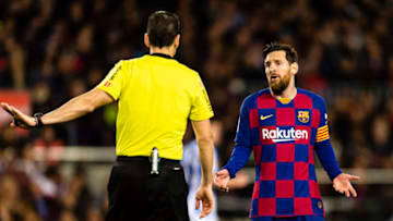 BARCELONA, SPAIN - MARCH 07: Lionel Messi of FC Barcelona (R) talks to FIFA Referee Juan Martinez Munuera (L) during the Liga match between FC Barcelona and Real Sociedad at Camp Nou on March 7, 2020 in Barcelona, Spain. (Photo by Eurasia Sport Images/Getty Images)