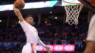 Mar 22, 2016; Oklahoma City, OK, USA; Oklahoma City Thunder guard Russell Westbrook (0) dunks the ball against the Houston Rockets during the fourth quarter at Chesapeake Energy Arena. Mandatory Credit: Mark D. Smith-USA TODAY Sports