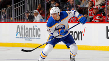 NEWARK, NEW JERSEY - OCTOBER 23: Dylan Cozens #24 of the Buffalo Sabres in action against the New Jersey Devils at Prudential Center on October 23, 2021 in Newark, New Jersey. The Devils defeated the Sabres 2-1 in overtime. (Photo by Jim McIsaac/Getty Images)