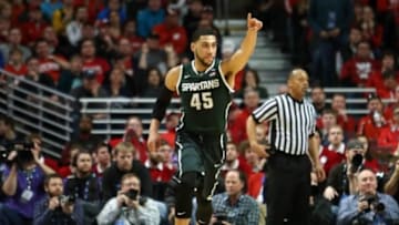 Mar 15, 2015; Chicago, IL, USA; Michigan State Spartans guard Denzel Valentine (45) reacts after a made basket against the Wisconsin Badgers during the first half in the championship game of the Big Ten Tournament at United Center. Mandatory Credit: Caylor Arnold-USA TODAY Sports