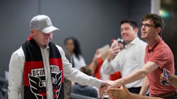 English soccer player Wayne Rooney arrives at Dulles International Airport on June 28, 2018 in Dulles, Virginia. - Rooney will join Major League Soccer's DC United and will debut with the team July 14, 2018. England record goalscorer Wayne Rooney left boyhood club Everton for D.C. United of Major League Soccer on Thursday, saying he hungers for American success to fulfill a career goal. The US club and English Premier League outfit announced the agreement on a permanent transfer as Rooney was on a flight to Washington. (Photo by ZACH GIBSON / AFP) (Photo credit should read ZACH GIBSON/AFP/Getty Images)