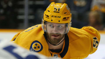 NASHVILLE, TENNESSEE - APRIL 04: Nashville Predators left wing Austin Watson #51 lines up for a faceoff against the Vancouver Canucks during the first period at Bridgestone Arena on April 04, 2019 in Nashville, Tennessee. (Photo by Frederick Breedon/Getty Images)