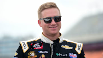 CHARLOTTE, NORTH CAROLINA - SEPTEMBER 28: Tyler Reddick, driver of the #2 Emerson Chevrolet, stands on the grid during qualifying for the NASCAR Xfinity Series Drive for the Cure 250 presented by Blue Cross Blue Shield of North Carolina at Charlotte Motor Speedway on September 28, 2019 in Charlotte, North Carolina. (Photo by Jared C. Tilton/Getty Images)