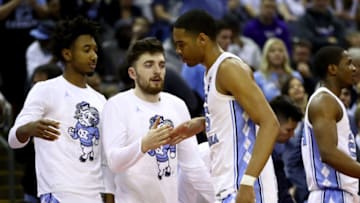 COLUMBUS, OHIO - MARCH 24: Garrison Brooks #15 of the North Carolina Tar Heels is greeted after being pulled from the game in the final moments of their 81-59 win against the Washington Huskies in the Second Round of the NCAA Basketball Tournament at Nationwide Arena on March 24, 2019 in Columbus, Ohio. (Photo by Gregory Shamus/Getty Images)