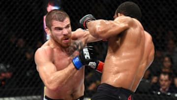 SAO PAULO, BRAZIL - OCTOBER 28: (L-R) Jim Miller punches Francisco Trinaldo of Brazil in their lightweight bout during the UFC Fight Night event inside the Ibirapuera Gymnasium on October 28, 2017 in Sao Paulo, Brazil. (Photo by Josh Hedges/Zuffa LLC/Zuffa LLC via Getty Images)