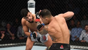 NEWARK, NJ - AUGUST 03: (L-R) Nasrat Haqparast of Germany punches Joaquim Silva of Brazil in their lightweight bout during the UFC Fight Night event at the Prudential Center on August 3, 2019 in Newark, New Jersey. (Photo by Josh Hedges/Zuffa LLC/Zuffa LLC via Getty Images)