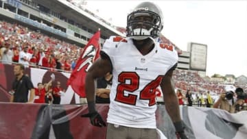 Sep 15, 2013; Tampa, FL, USA; Tampa Bay Buccaneers cornerback Darrelle Revis (24) reacts during introductions prior to the game against the New Orleans Saints at Raymond James Stadium. Mandatory Credit: Kim Klement-USA TODAY Sports