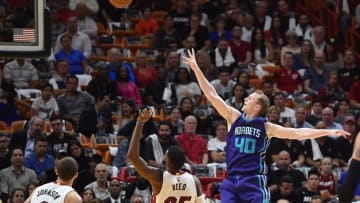 Oct 28, 2016; Miami, FL, USA; Charlotte Hornets forward Cody Zeller (40) shoots the ball as Miami Heat forward Willie Reed (35) looks on during the first half at American Airlines Arena. Mandatory Credit: Steve Mitchell-USA TODAY Sports
