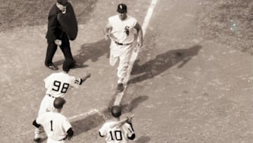 CHICAGO, IL - OCTOBER 1959: Ted Kluszewski #8 of the Chicago White Sox on his way to home plate after hitting a home run against the Los Angeles Dodgers during Game 1 of the 1959 World Series on October 1, 1959 in Chicago, Illinois. (Photo by Herb Scharfman/Sports Imagery/Getty Images)
