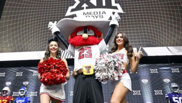 Jul 13, 2023; Arlington, TX, USA; The Texas Tech Red Raiders mascot and cheerleaders pose for a photo before the start of the Big 12 football media day at AT&T Stadium. Mandatory Credit: Jerome Miron-USA TODAY Sports
