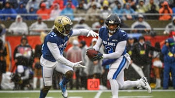 ORLANDO, FL - JANUARY 27: Russell Wilson #3 of the Seattle Seahawks attempts a handoff to Alvin Kamara #41 of the New Orleans Saints during the 2019 NFL Pro Bowl at Camping World Stadium on January 27, 2019 in Orlando, Florida. (Photo by Mark Brown/Getty Images)
