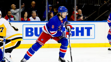 NEW YORK, NY - MARCH 18: Jacob Trouba #8 of the New York Rangers skates down the ice during the first period of the game against the Pittsburgh Penguins on March 18, 2023 at Madison Square Garden in New York, New York. (Photo by Rich Graessle/Getty Images)