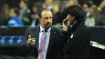 MILAN, ITALY - SEPTEMBER 29: FC Internazionale Milano head coach Rafael Benitez (L) speaks with Mauricio Andres Pellegrino prior to the UEFA Champions League group A match between FC Internazionale Milano and SV Werder Bremen at Stadio Giuseppe Meazza on September 29, 2010 in Milan, Italy. (Photo by Valerio Pennicino/Getty Images)