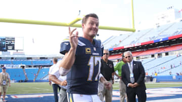 BUFFALO, NY - SEPTEMBER 16: Philip Rivers #17 of the Los Angeles Chargers runs off the field after their victory during NFL game action against the Buffalo Bills at New Era Field on September 16, 2018 in Buffalo, New York. (Photo by Tom Szczerbowski/Getty Images)