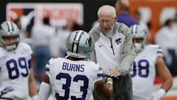 AUSTIN, TX - OCTOBER 07: Head coach Bill Snyder of the Kansas State Wildcats greets Tyler Burns