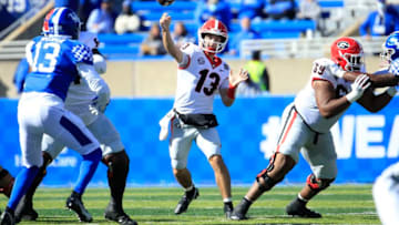 LEXINGTON, KENTUCKY - OCTOBER 31: Stetson Bennett #13 of the Georgia Bulldogs throw a pass against the Kentucky Wildcats at Kroger Field on October 31, 2020 in Lexington, Kentucky. (Photo by Andy Lyons/Getty Images)