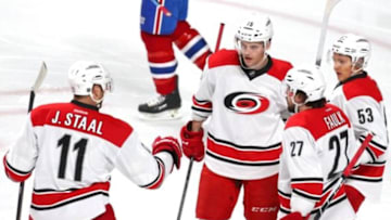 Feb 7, 2016; Montreal, Quebec, CAN; Carolina Hurricanes left wing Jeff Skinner (53) celebrates his goal against Montreal Canadiens with teammates during the first period at Bell Centre. Mandatory Credit: Jean-Yves Ahern-USA TODAY Sports