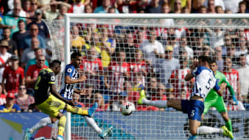 BRIGHTON, ENGLAND - AUGUST 24: Moussa Djenepo of Southampton scores his team's first goal during the Premier League match between Brighton & Hove Albion and Southampton FC at American Express Community Stadium on August 24, 2019 in Brighton, United Kingdom. (Photo by Henry Browne/Getty Images)