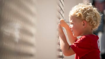 FORT MYERS, FL - FEBRUARY 25: The son of Chris Sale #41 of the Boston Red Sox watches Sale throw live batting practice during a Spring Training team workout on February 25, 2023 at JetBlue Park at Fenway South in Fort Myers, Florida. (Photo by Maddie Malhotra/Boston Red Sox/Getty Images)