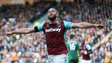 HULL, ENGLAND - APRIL 01: Andy Carroll of West am United celebrates scoring his sides first goal during the Premier League match between Hull City and West Ham United at KCOM Stadium on April 1, 2017 in Hull, England. (Photo by Alex Morton/Getty Images)