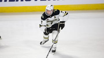 WORCESTER, MA - MARCH 25: Ronnie Attard #7 of the Western Michigan Broncos skates against the Northeastern Huskies during the NCAA Men's Ice Hockey Northeast Regional game at the DCU Center on March 25, 2022 in Worcester, Massachusetts. The Broncos won 2-1 in overtime. (Photo by Richard T Gagnon/Getty Images)
