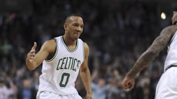 Mar 23, 2016; Boston, MA, USA; Boston Celtics guard Avery Bradley (0) celebrates after scoring during the second half against the Toronto Raptors at TD Garden. Mandatory Credit: Bob DeChiara-USA TODAY Sports
