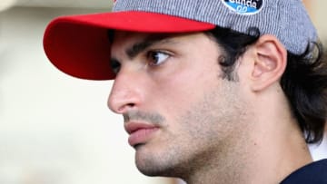 SINGAPORE - SEPTEMBER 17: Carlos Sainz of Spain and Scuderia Toro Rosso on the drivers parade before the Formula One Grand Prix of Singapore at Marina Bay Street Circuit on September 17, 2017 in Singapore. (Photo by Mark Thompson/Getty Images)