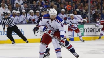 Oct 11, 2014; Columbus, OH, USA; New York Rangers left wing Rick Nash (61) controls the puck against the Columbus Blue Jackets during the third period at Nationwide Arena. Columbus defeated New York 5-2. Mandatory Credit: Russell LaBounty-USA TODAY Sports