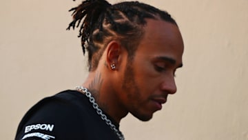 ABU DHABI, UNITED ARAB EMIRATES - NOVEMBER 28: Lewis Hamilton of Great Britain and Mercedes GP looks on in the Paddock during previews ahead of the F1 Grand Prix of Abu Dhabi at Yas Marina Circuit on November 28, 2019 in Abu Dhabi, United Arab Emirates. (Photo by Dan Istitene/Getty Images)