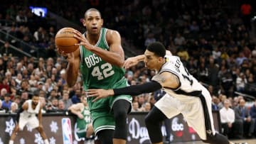 Dec 14, 2016; San Antonio, TX, USA; Boston Celtics center Al Horford (42) looks to a pass as he drives against San Antonio Spurs shooting guard Danny Green (14, right) during the first half at AT&T Center. Mandatory Credit: Soobum Im-USA TODAY Sports