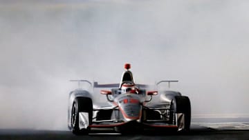 FORT WORTH, TX - JUNE 10: Will Power, driver of the #12 Verizon Team Penske Chevrolet, does a burnout following his win in the Verizon IndyCar Series Rainguard Water Sealers 600 at Texas Motor Speedway on June 10, 2017 in Fort Worth, Texas. (Photo by Sean Gardner/Getty Images)