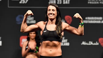 Jan 22, 2021; Abu Dhabi, UNITED ARAB EMIRATES; Marina Rodriguez of Brazil poses on the scale during the UFC 257 weigh-in at Etihad Arena on UFC Fight Island on January 22, 2021 in Abu Dhabi, United Arab Emirates. Mandatory Credit: Jeff Bottari/Handout Photo via USA TODAY Sports