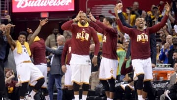 May 4, 2016; Cleveland, OH, USA; The Cleveland Cavaliers bench, including guard Iman Shumpert (4), guard J.R. Smith (5), and center Tristan Thompson (13) celebrate Cleveland Cavaliers guard Mo Williams