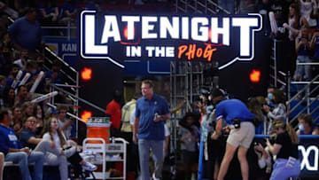 Kansas coach Bill Self enters Allen Fieldhouse for Late Night in the Phog Friday night .