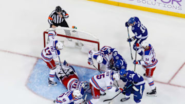 TAMPA, FL - NOVEMBER 2: The Tampa Bay Lightning battle for the puck against the New York Rangers during the second period at Amalie Arena on November 2, 2017 in Tampa, Florida. (Photo by Scott Audette/NHLI via Getty Images)