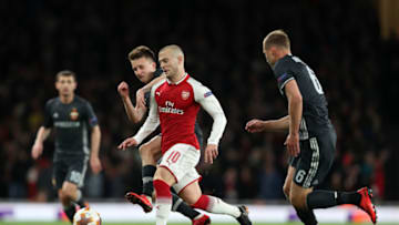 LONDON, ENGLAND - APRIL 05: Jack Wilshere of Arsenal is tackled by Aleksandr Golovin of CSKA Moskva during the UEFA Europa League quarter final first leg match between Arsenal FC and CSKA Moskva at Emirates Stadium on April 5, 2018 in London, United Kingdom. (Photo by Dan Istitene/Getty Images,)