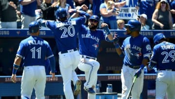 Jun 14, 2016; Toronto, Ontario, CAN; Toronto Blue Jays third baseman Josh Donaldson (20) celebrates a grand slam against Philadelphia Phillies with left fielder Jose Bautista (19), center fielder Kevin Pillar (11), designated hitter Edwin Encarnacion (10) and second baseman Devon Travis (29) in the third inning at Rogers Centre. Mandatory Credit: Dan Hamilton-USA TODAY Sports