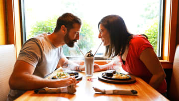 MURFREESBORO, TENNESSEE - JULY 06: Walker Hayes and wife Laney Beville Hayes are seen at Applebee's on July 06, 2021 in Murfreesboro, Tennessee. (Photo by Jason Kempin/Getty Images for Applebee's )