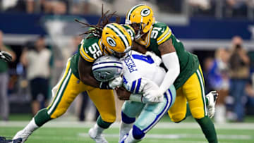 ARLINGTON, TX - OCTOBER 6: Za"u2019Darius Smith #55 and Preston Smith #91 of the Green Bay Packers sacks quarterback Dak Prescott #4 of the Dallas Cowboys at AT&T Stadium on October 6, 2019 in Arlington, Texas. The Packers defeated the Cowboys 34-24. (Photo by Wesley Hitt/Getty Images)