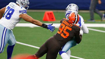 Dallas Cowboys quarterback Dak Prescott (4) is sacked by Cleveland Browns defensive end Myles Garrett (95) in the first quarter at AT&T Stadium. Mandatory Credit: Tim Heitman-USA TODAY Sports